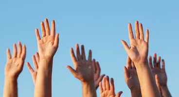 People holding up their hands. Used in CX feedback.